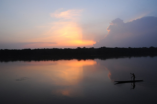 Upstream from Cut Hunter and his prey, Rivière Sangha in the Central African Republic, 2010. Source: Wikipedia Commons. Photographer not listed.